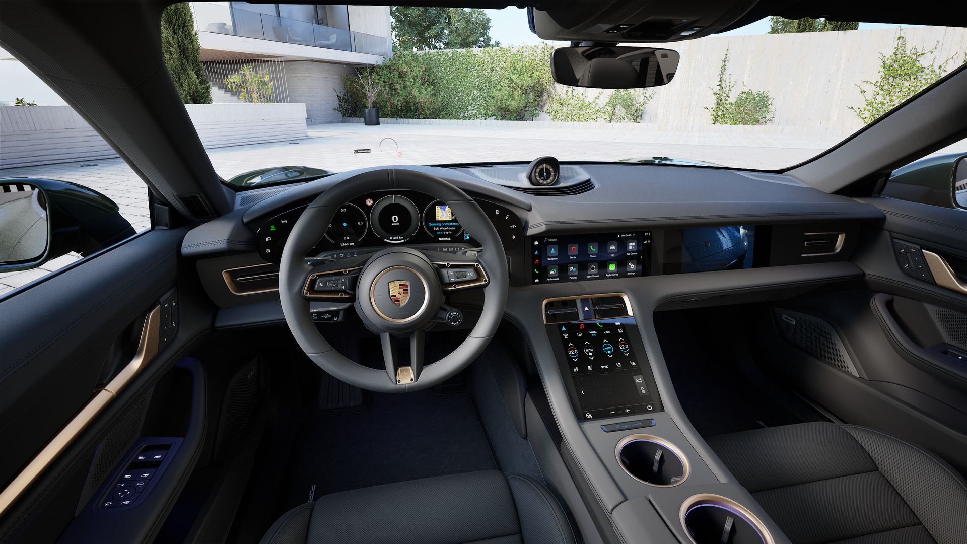 Interior view showing the steering wheel and dashboard of Taycan 4S