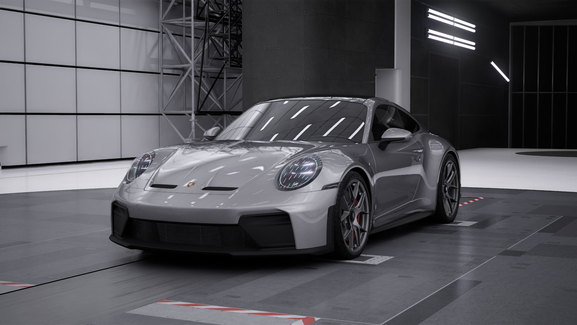 Vista esterna di 911 GT3 con pacchetto Touring che mostra la parte anteriore e il lato sinistro della vettura