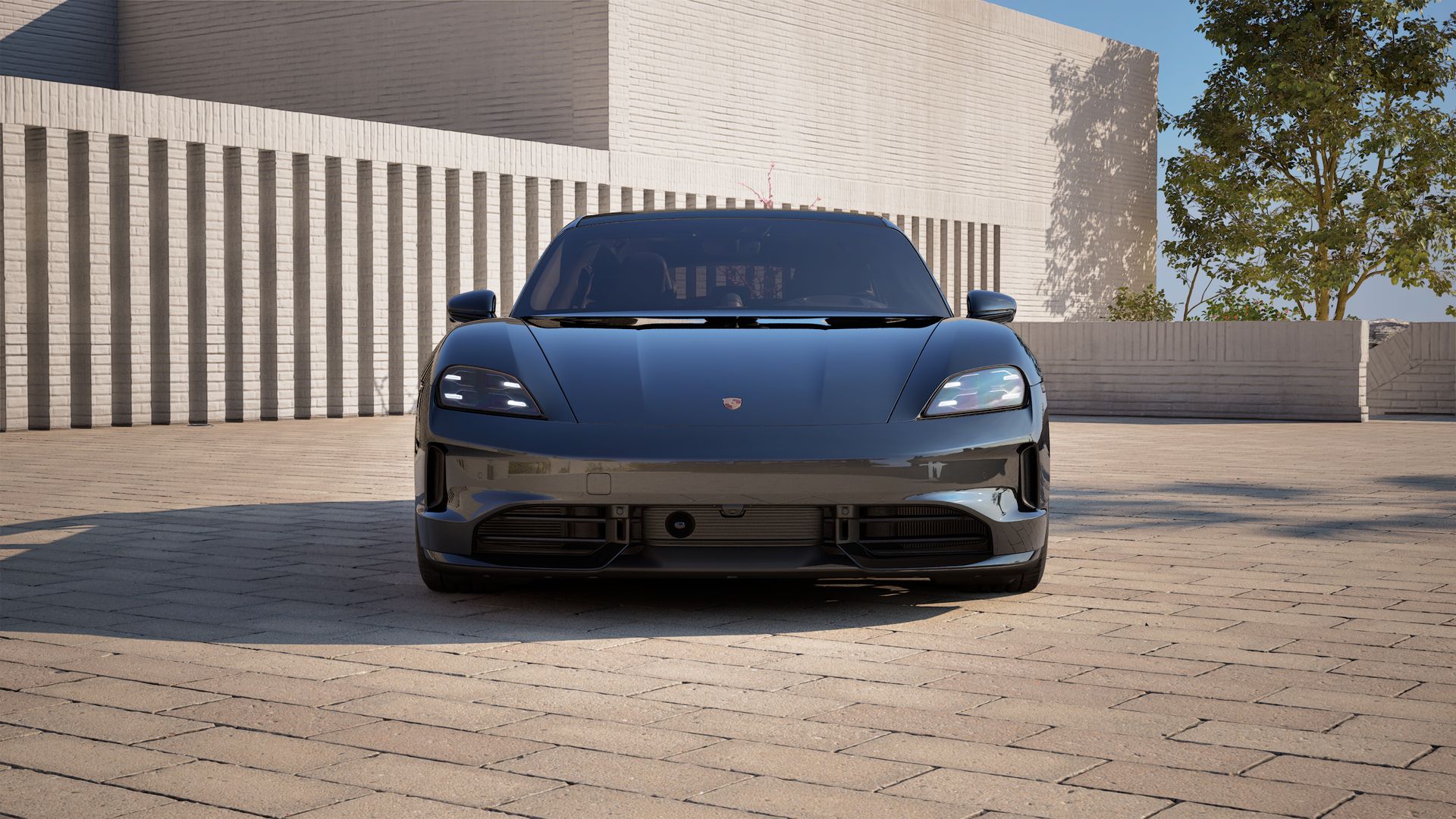 Außenansicht von Taycan GTS Sport Turismo mit Blick auf die Vorderseite des Fahrzeugs