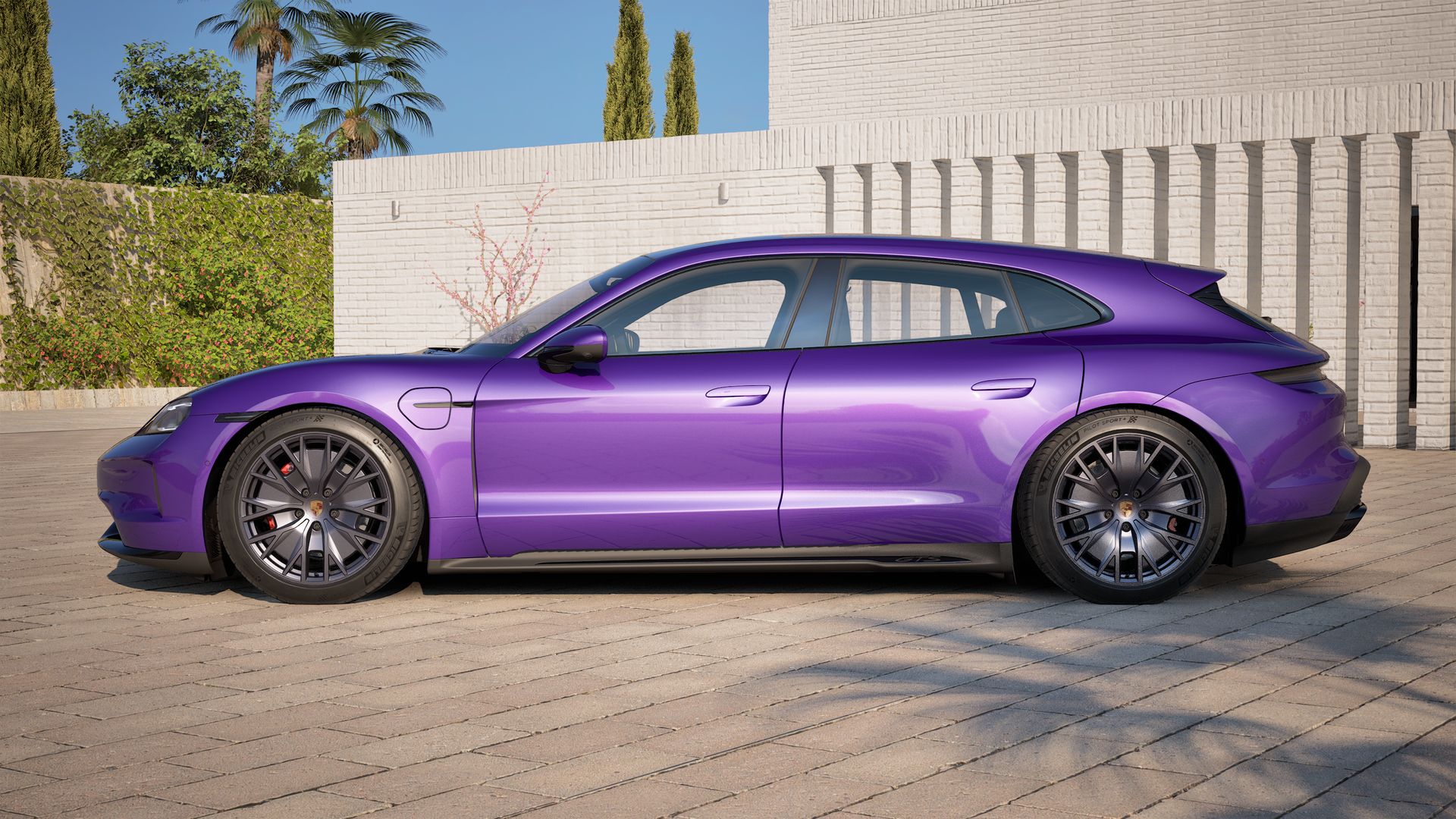 Die Außenansicht von Taycan GTS Sport Turismo zeigt die linke Seite des Fahrzeugs