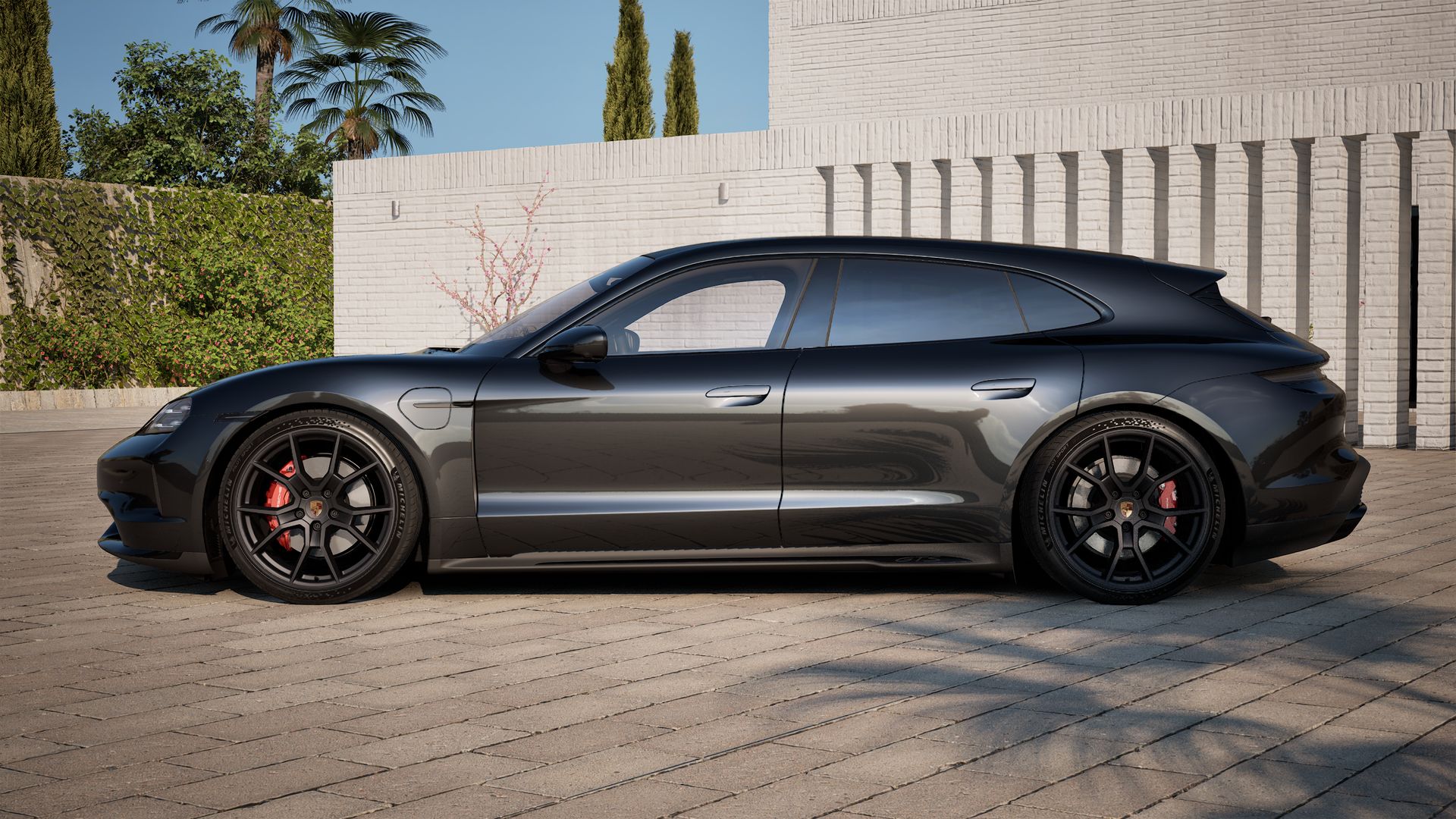 Die Außenansicht von Taycan GTS Sport Turismo zeigt die linke Seite des Fahrzeugs