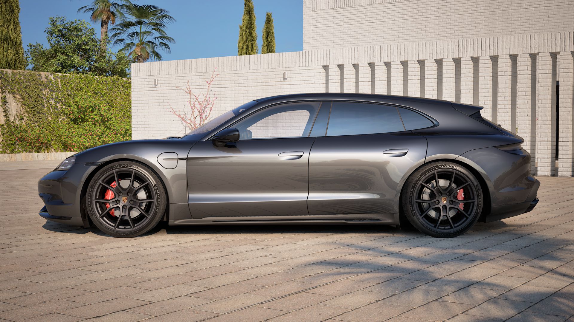 Die Außenansicht von Taycan GTS Sport Turismo zeigt die linke Seite des Fahrzeugs