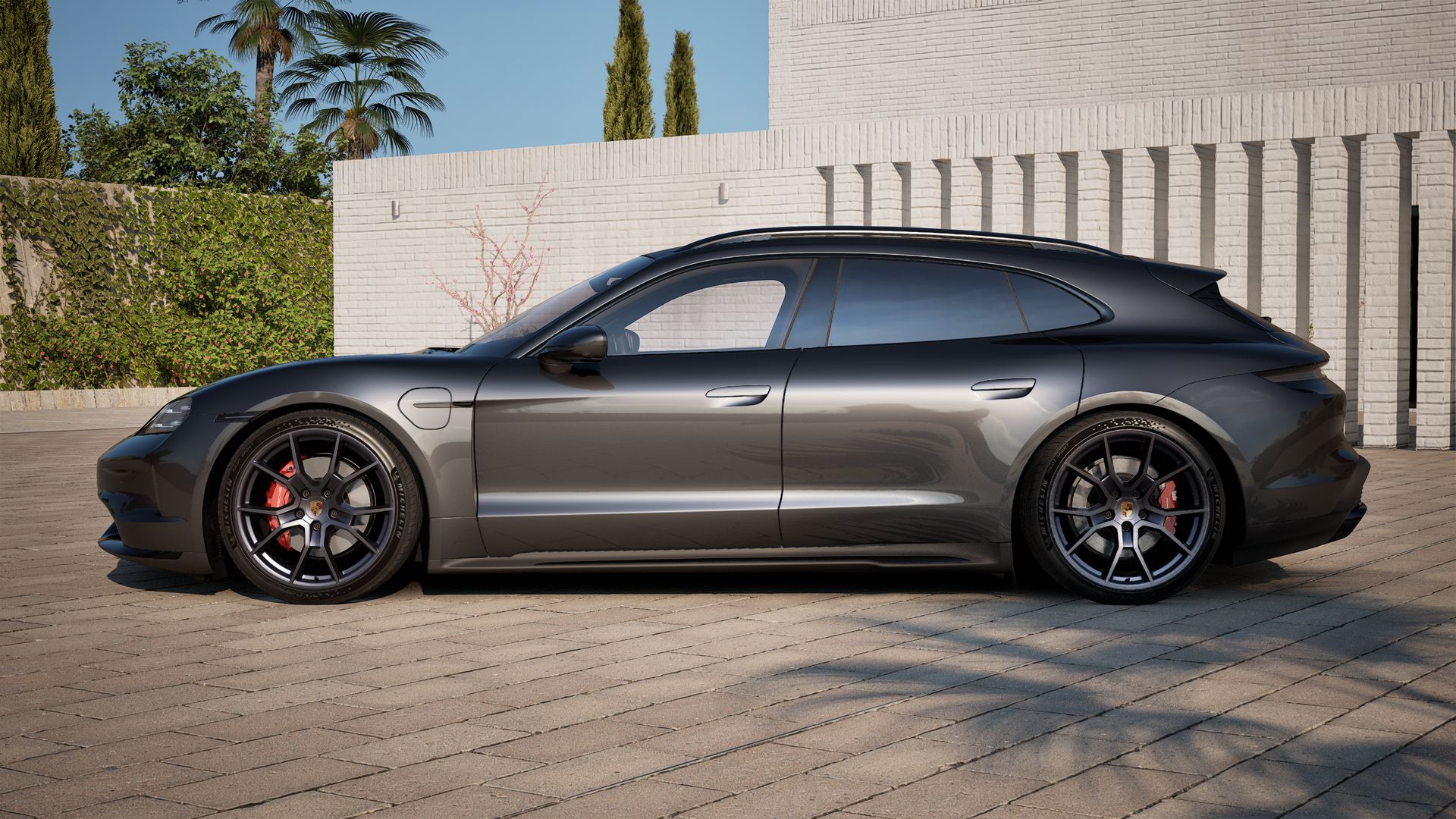 Die Außenansicht von Taycan GTS Sport Turismo zeigt die linke Seite des Fahrzeugs
