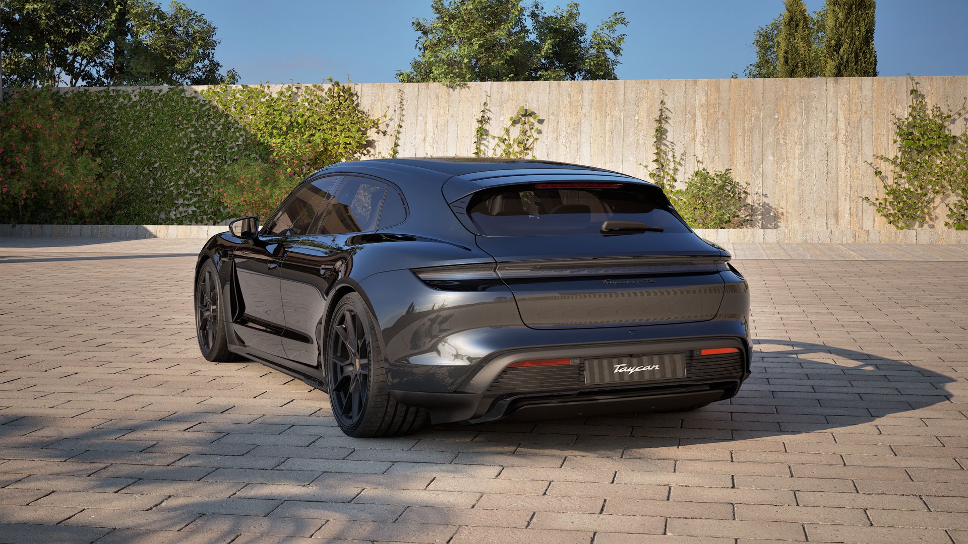 Außenansicht von Taycan GTS Sport Turismo mit der Rückseite und der linken Seite des Fahrzeugs