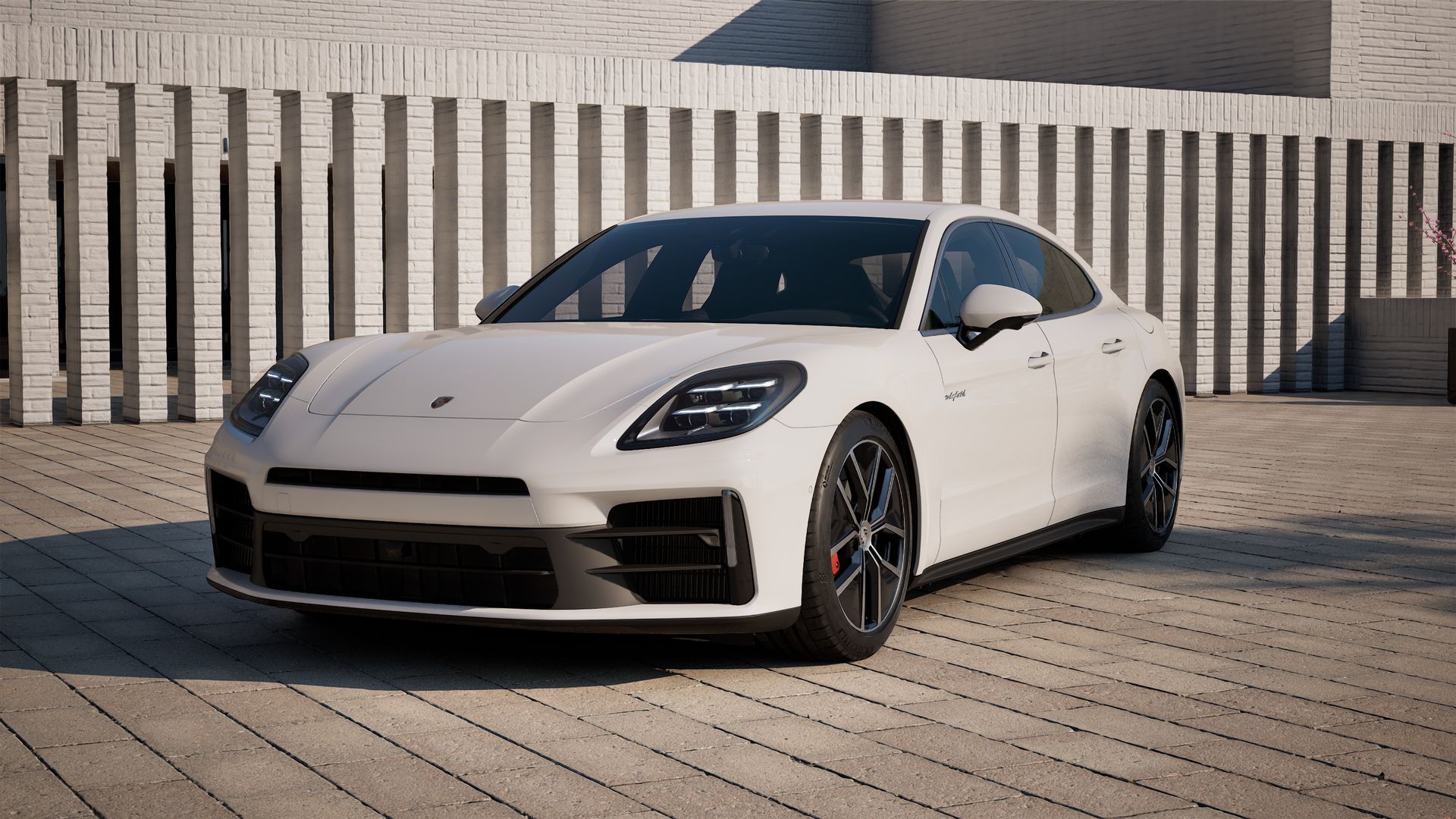 Vista esterna di Panamera 4S E-Hybrid che mostra la parte anteriore e il lato sinistro della vettura