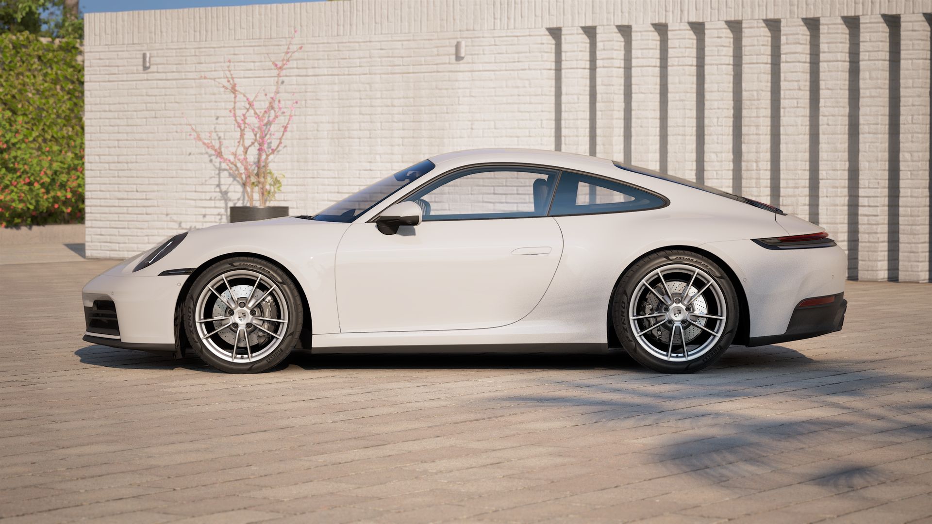 911 Carrera 外观图，显示汽车左侧