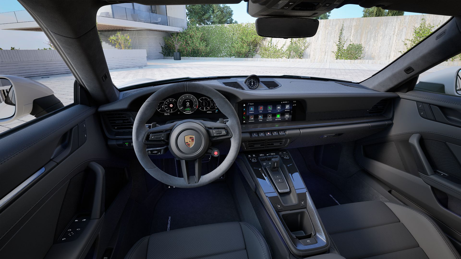 Vista interior, mostrando o volante e o painel de instrumentos de 911 Carrera GTS