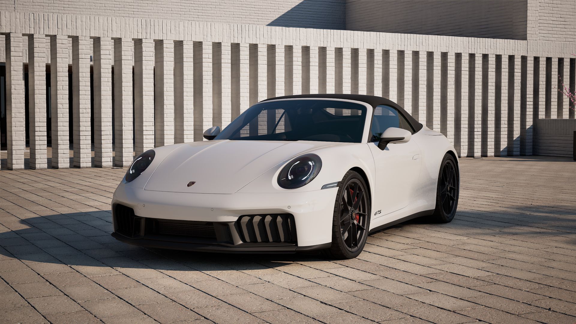 Vista exterior do 911 Carrera GTS Cabriolet, de frente e lateral esquerda