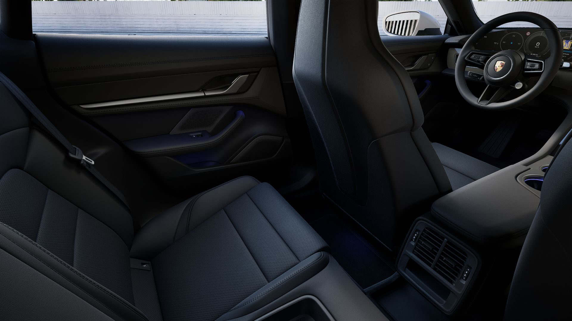 Vista interior, mostrando os bancos traseiros do Taycan Sport Turismo