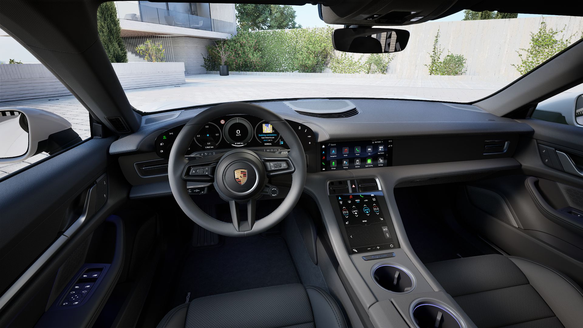 Vista interior, mostrando o volante e o painel de instrumentos de Taycan Sport Turismo