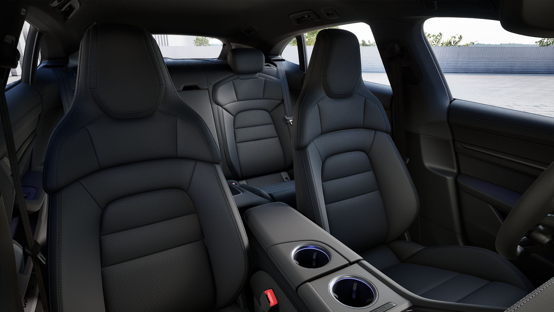 Vista interior, mostrando os bancos dianteiros do Taycan Sport Turismo