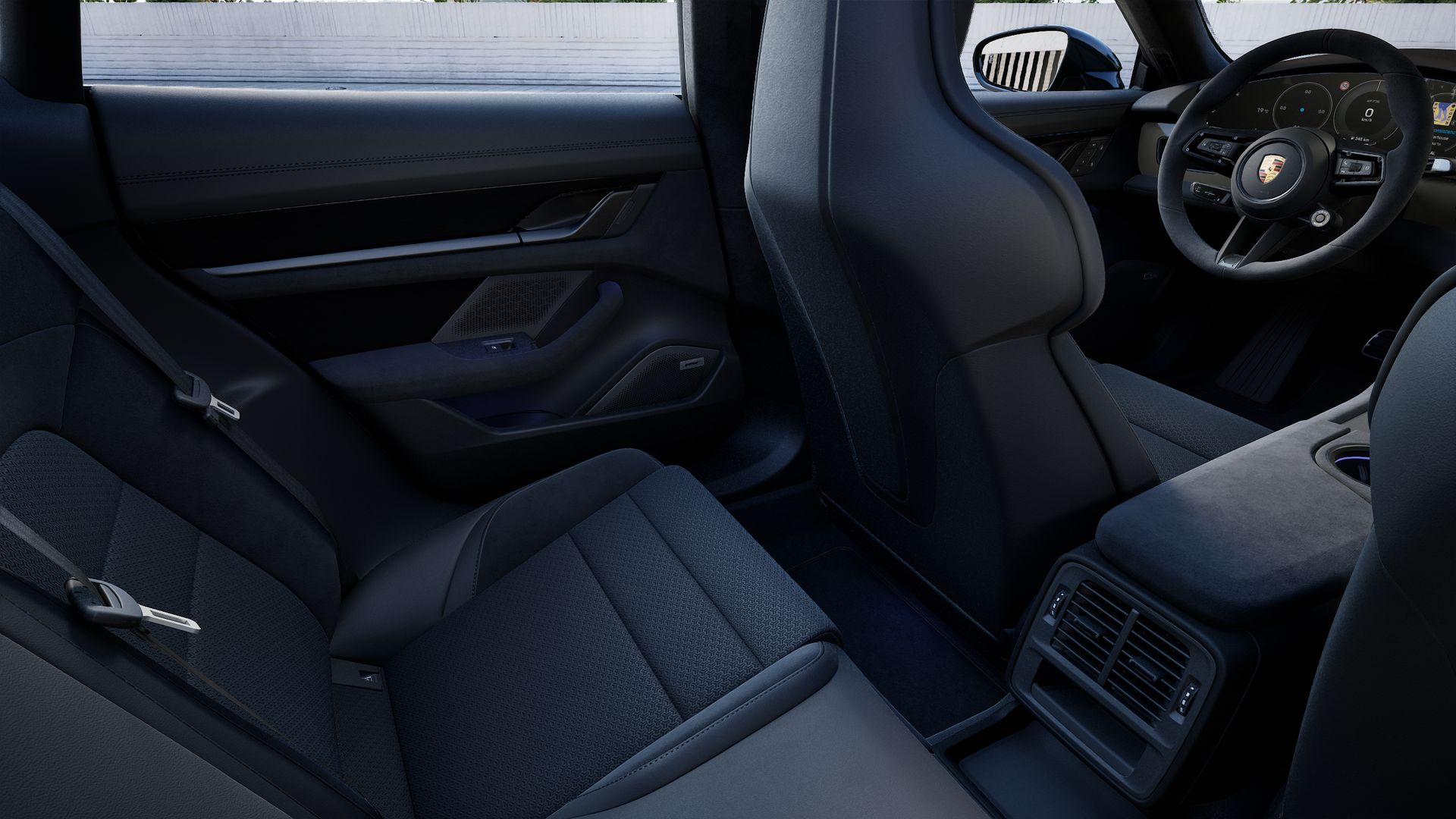 Vista interior, mostrando os bancos traseiros do Taycan GTS Sport Turismo