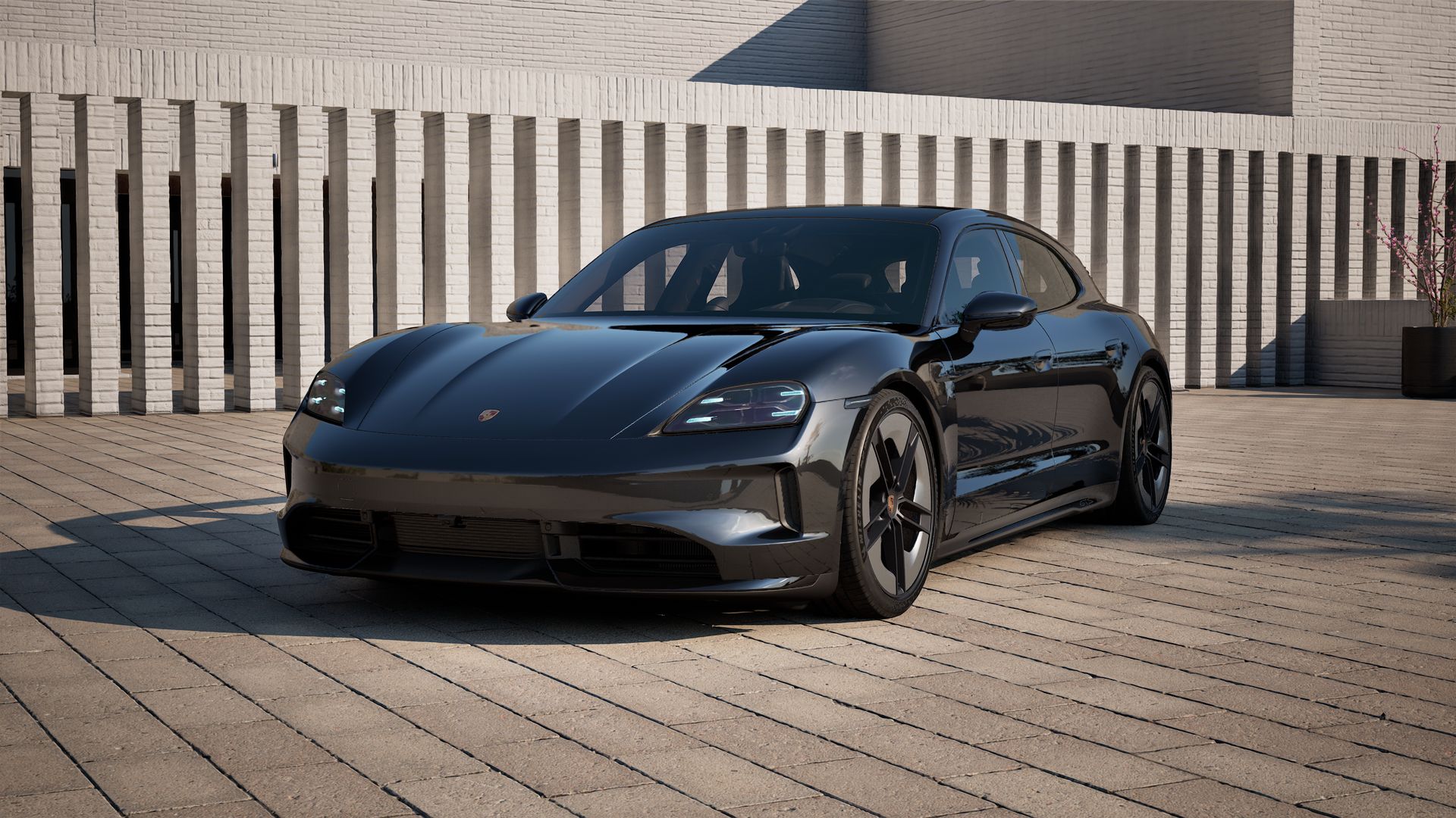 Vista exterior do Taycan GTS Sport Turismo, de frente e lateral esquerda