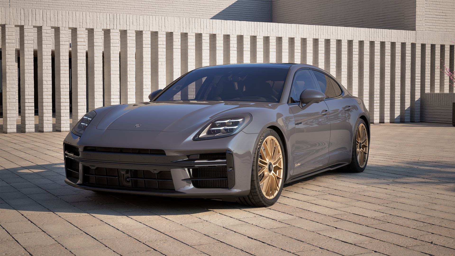 Vista exterior do Panamera Turbo E-Hybrid, de frente e lateral esquerda
