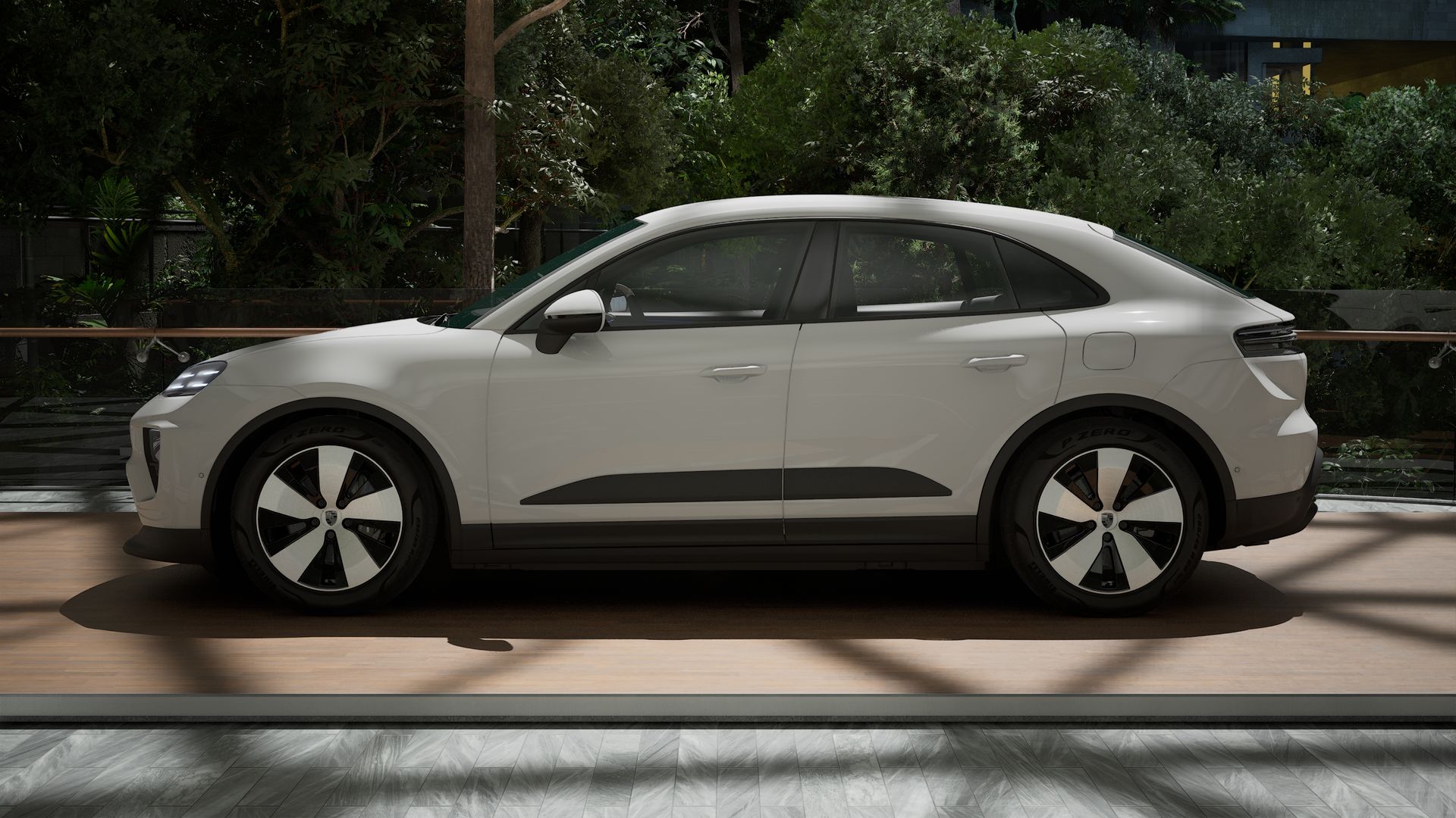 Exterior view of Macan 4 showing the left side of the car