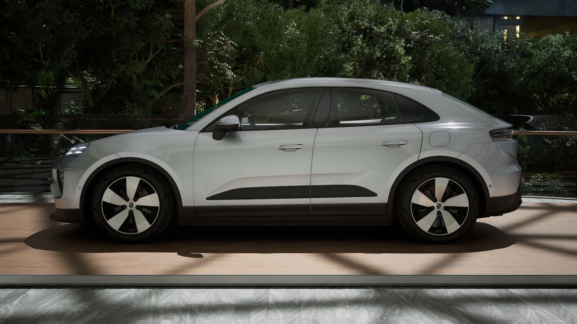 Exterior view of Macan 4 showing the left side of the car