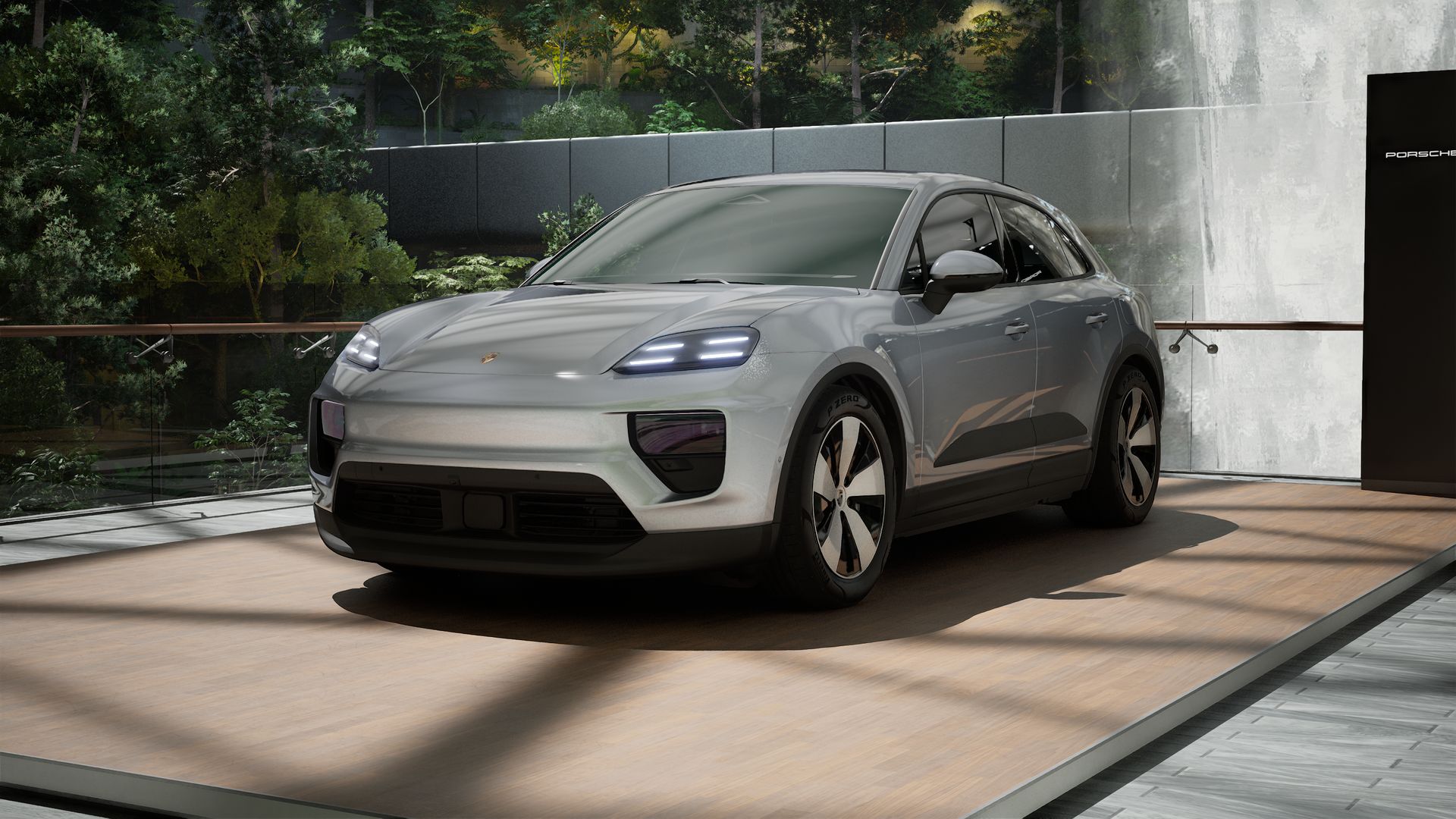 Exterior view of Macan 4 showing the front and left side of the car
