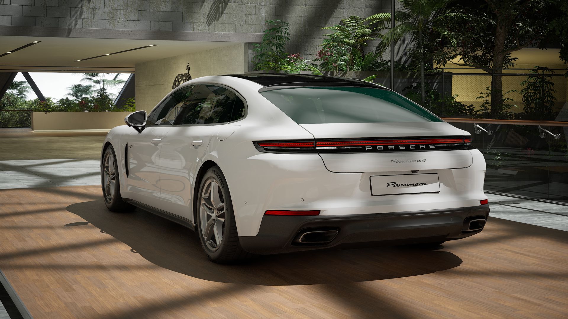 Exterior view of Panamera 4 E-Hybrid Executive showing the back and left side of the car