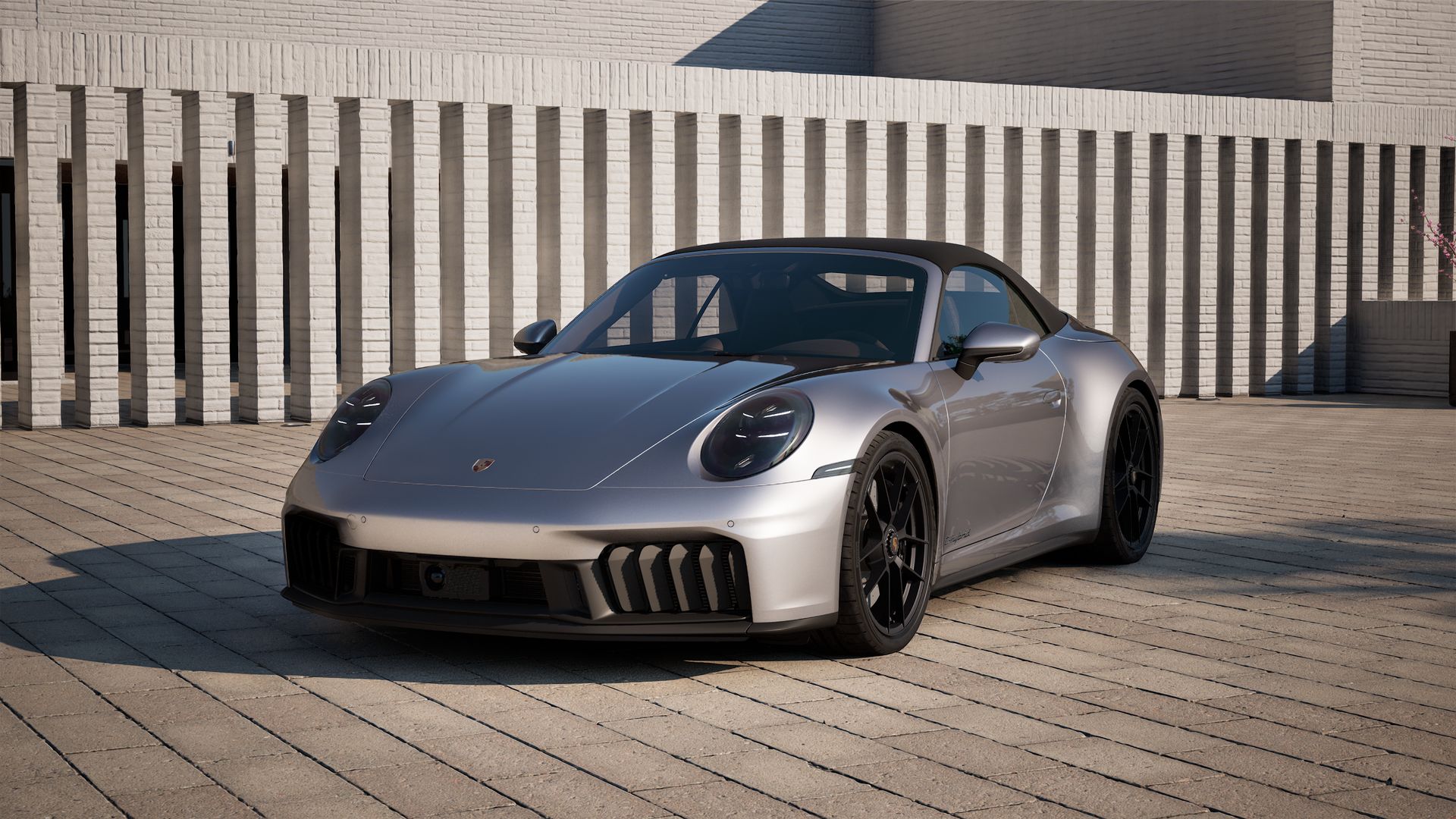 Exterior view of 911 Carrera GTS Cabriolet showing the front and left side of the car