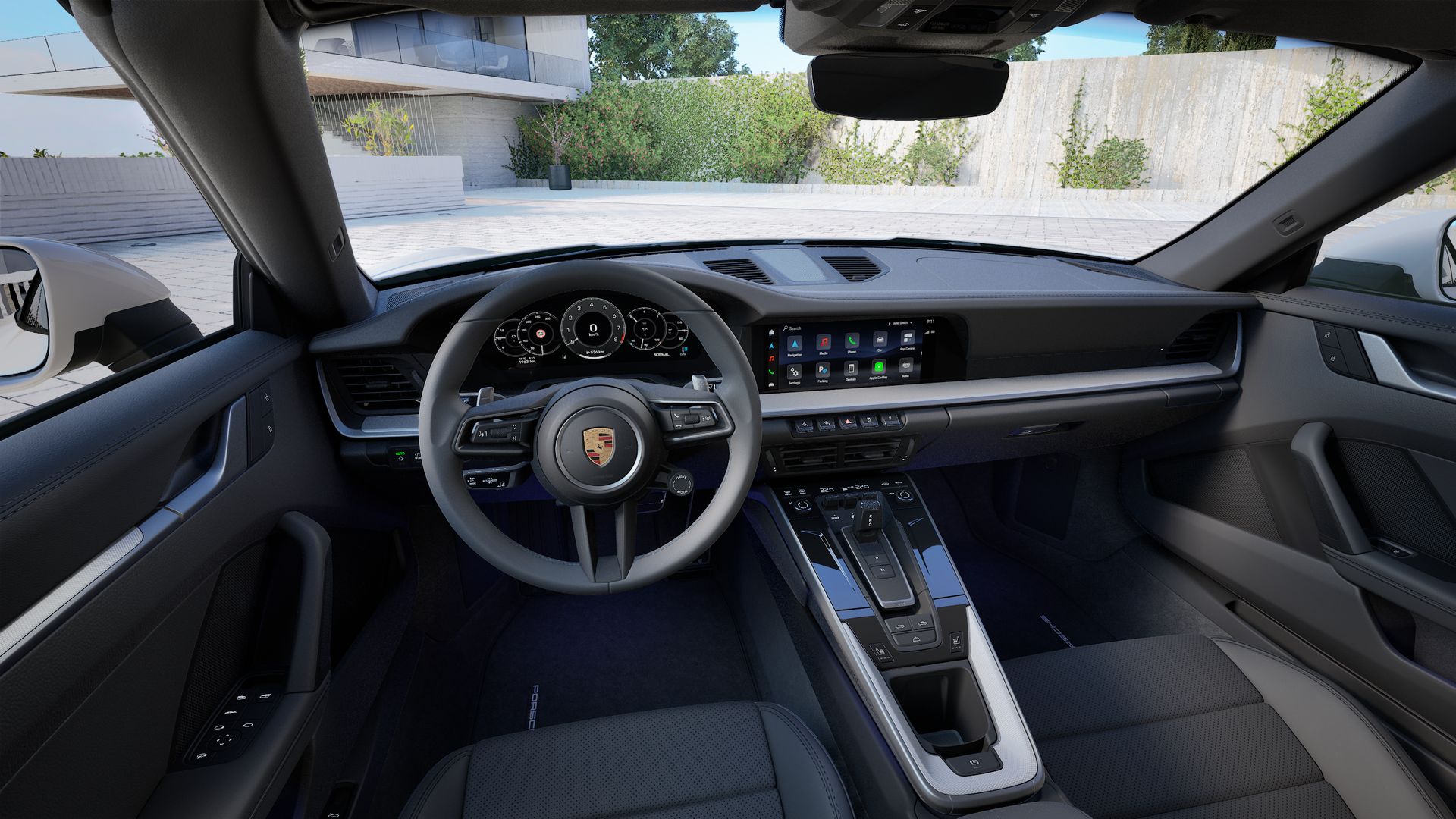 Interior view showing the steering wheel and dashboard of 911 Carrera Cabriolet