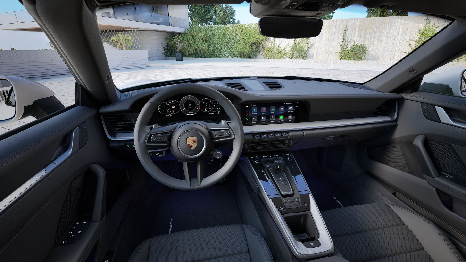 Interior view showing the steering wheel and dashboard of 911 Carrera S Cabriolet
