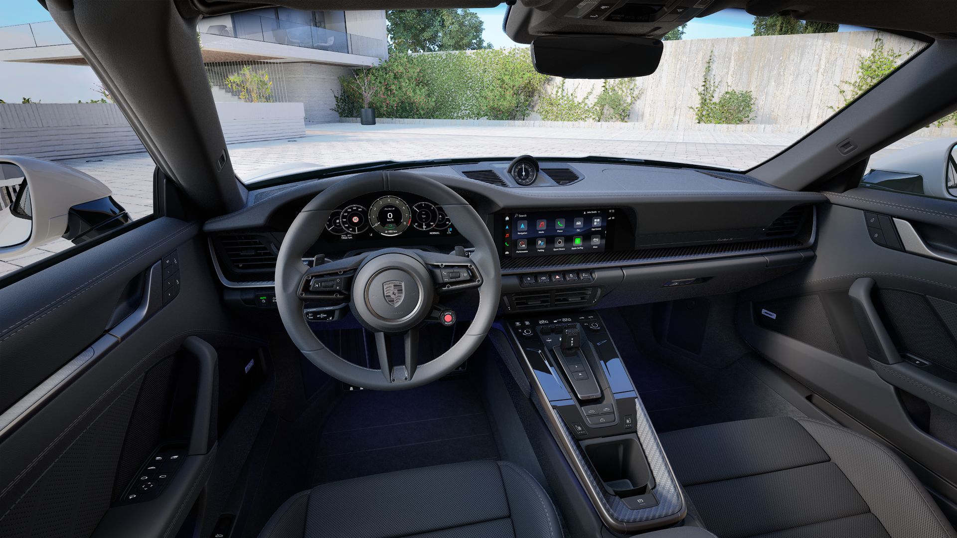Interior view showing the steering wheel and dashboard of 911 Turbo S Cabriolet