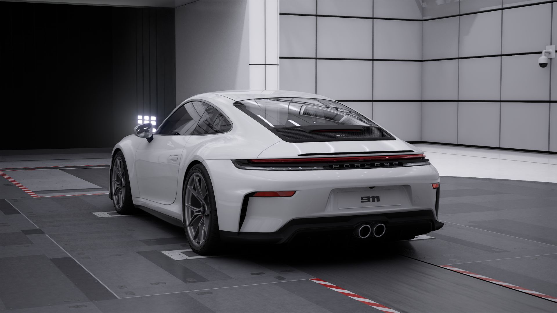 Exterior view of 911 GT3 with Touring Package showing the back and left side of the car