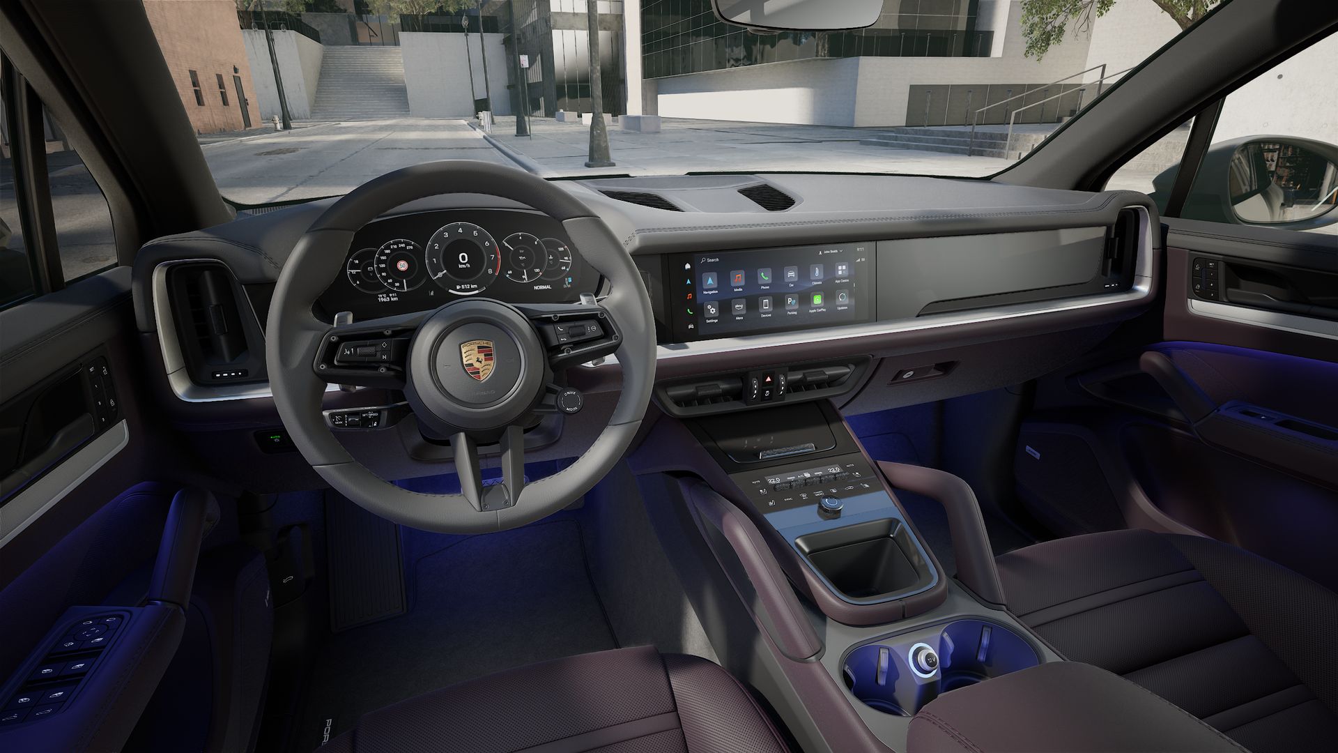 Interior view showing the steering wheel and dashboard of Cayenne