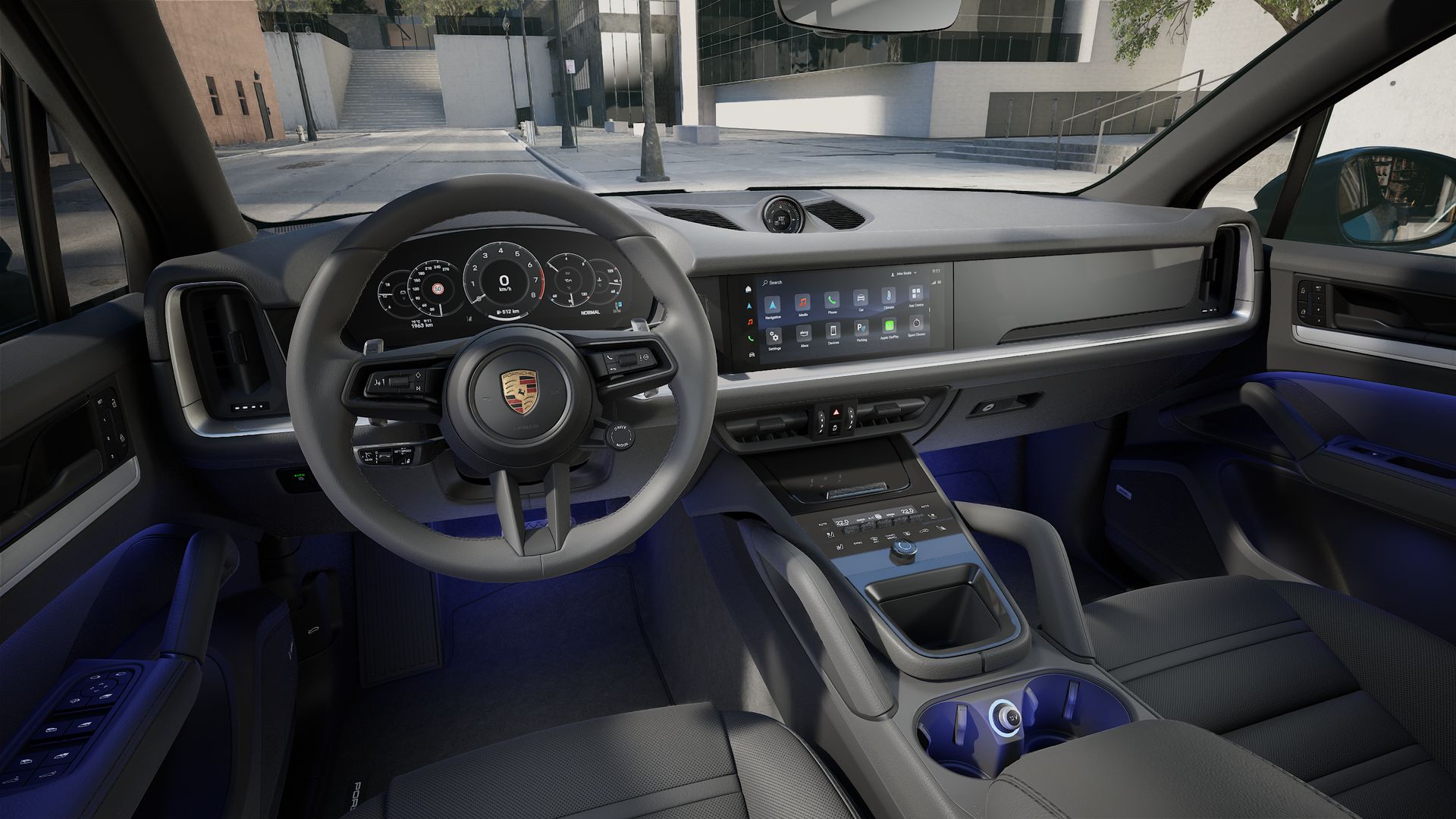 Interior view showing the steering wheel and dashboard of Cayenne