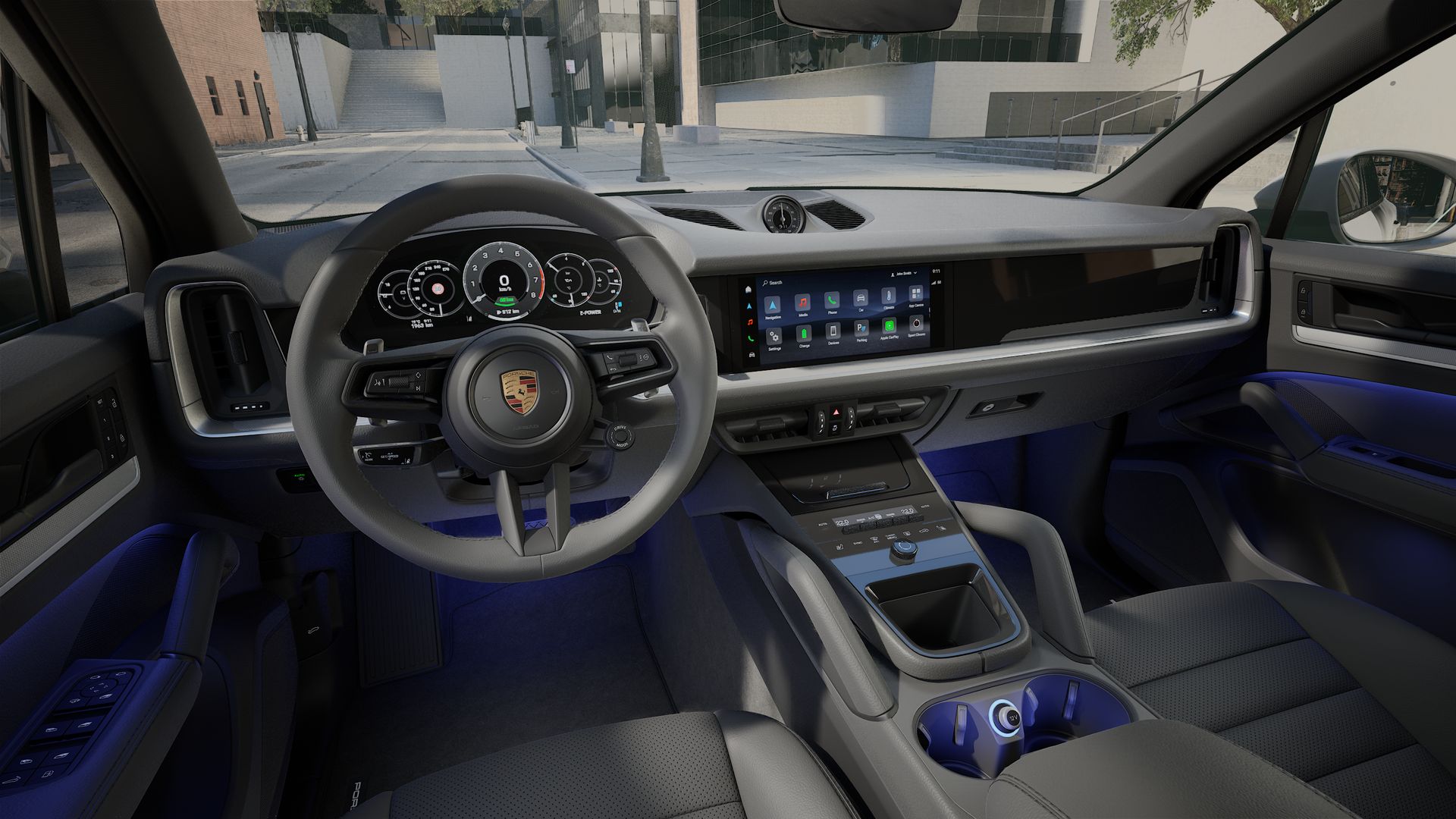 Interior view showing the steering wheel and dashboard of Cayenne E-Hybrid