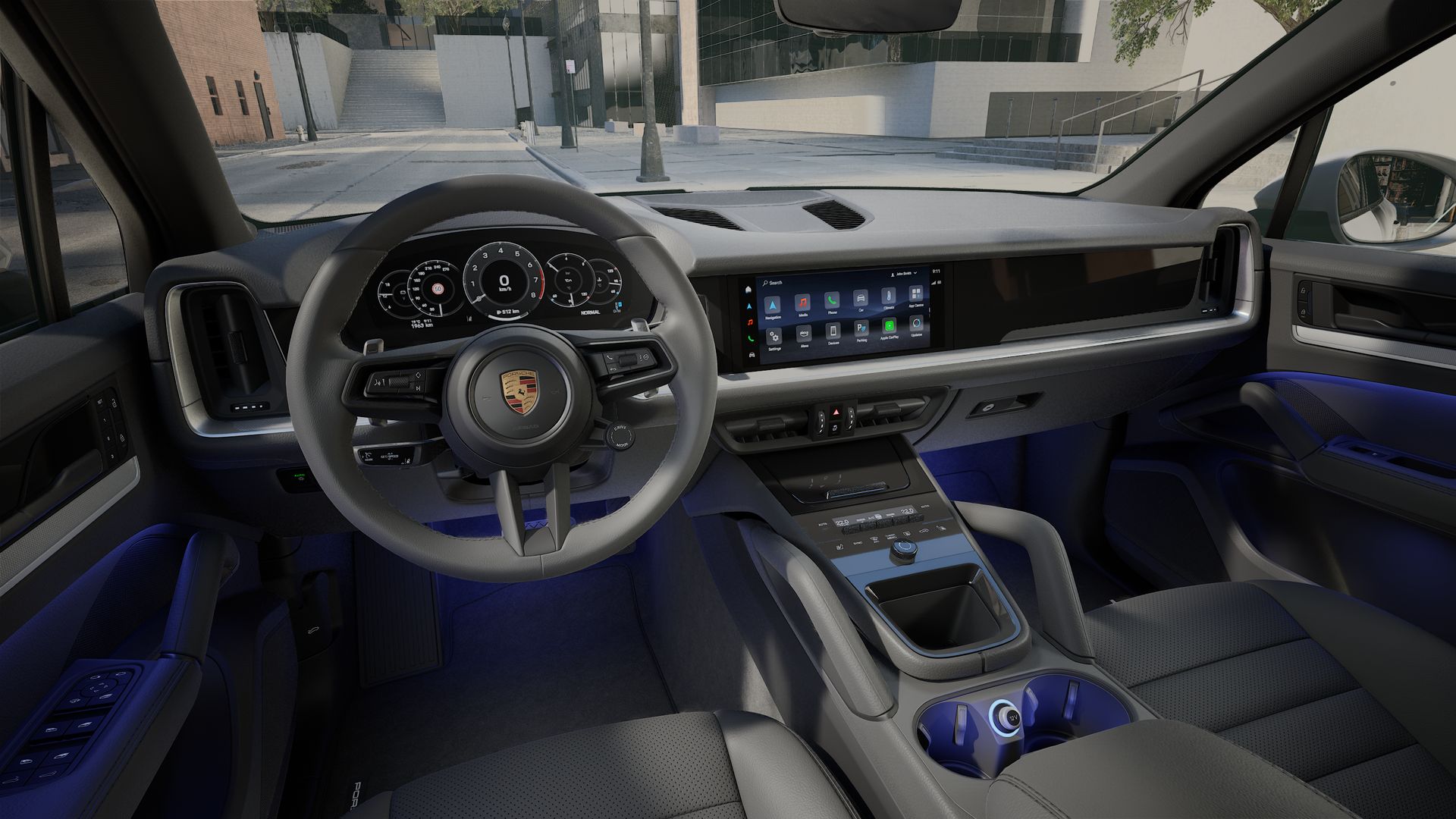 Interior view showing the steering wheel and dashboard of Cayenne S