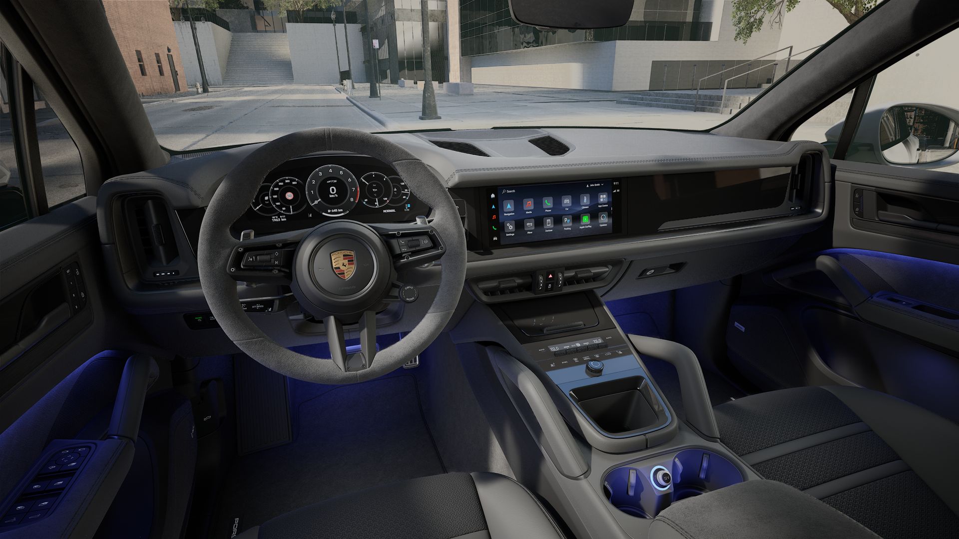 Interior view showing the steering wheel and dashboard of Cayenne GTS