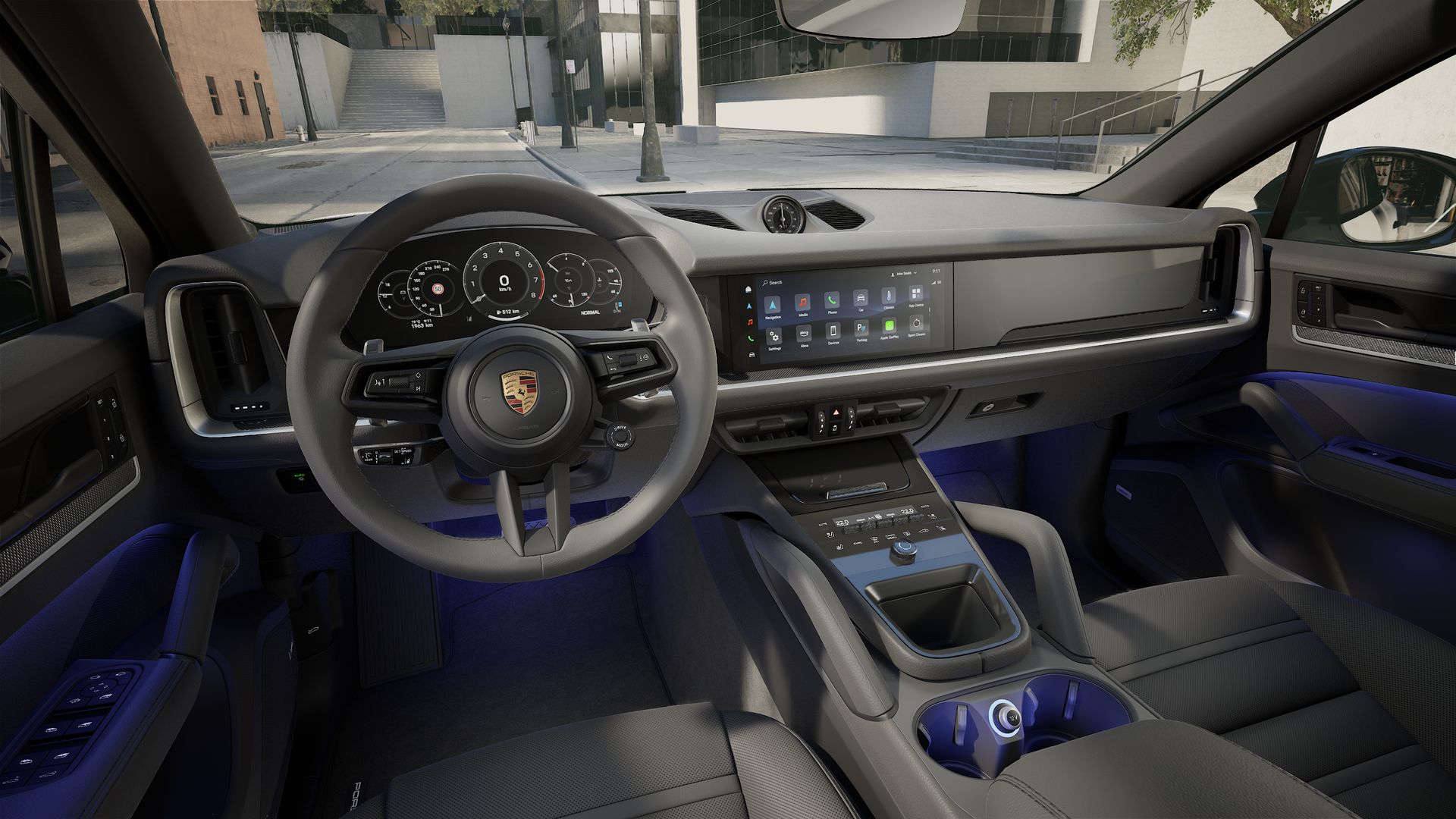 Interior view showing the steering wheel and dashboard of Cayenne Coupe