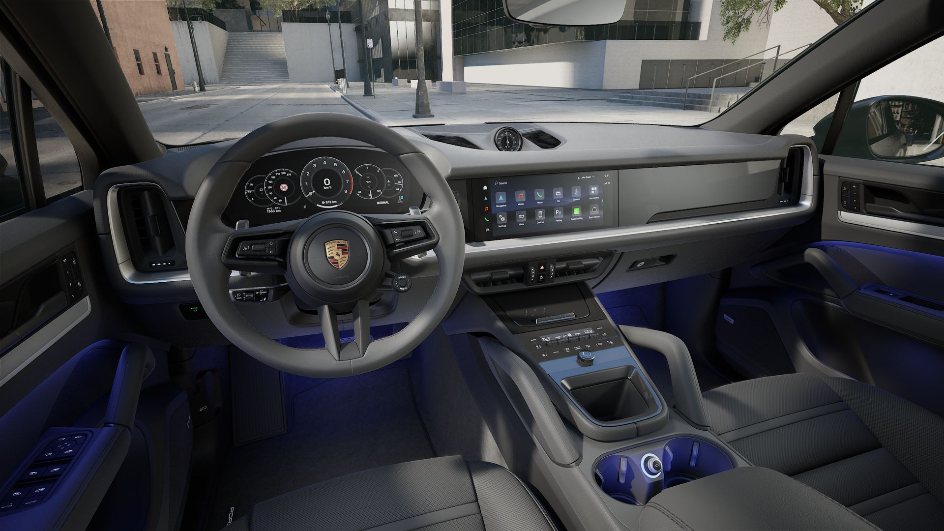 Interior view showing the steering wheel and dashboard of Cayenne Coupe