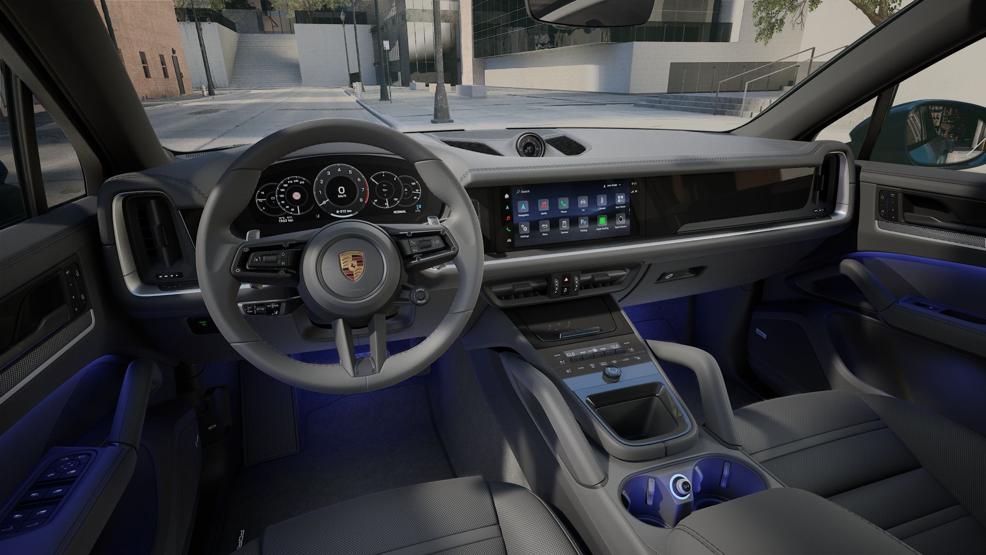 Interior view showing the steering wheel and dashboard of Cayenne Coupe