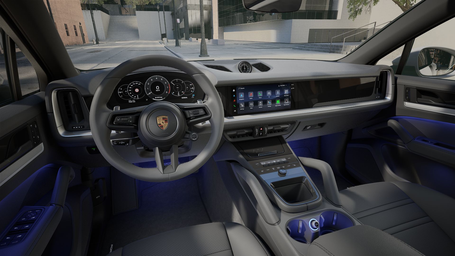 Interior view showing the steering wheel and dashboard of Cayenne Coupe