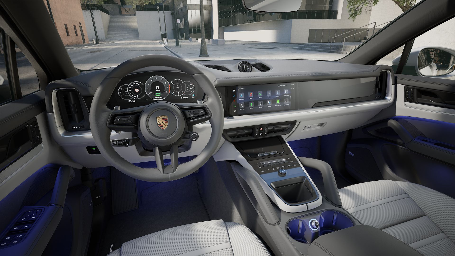 Interior view showing the steering wheel and dashboard of Cayenne S E-Hybrid Coupe