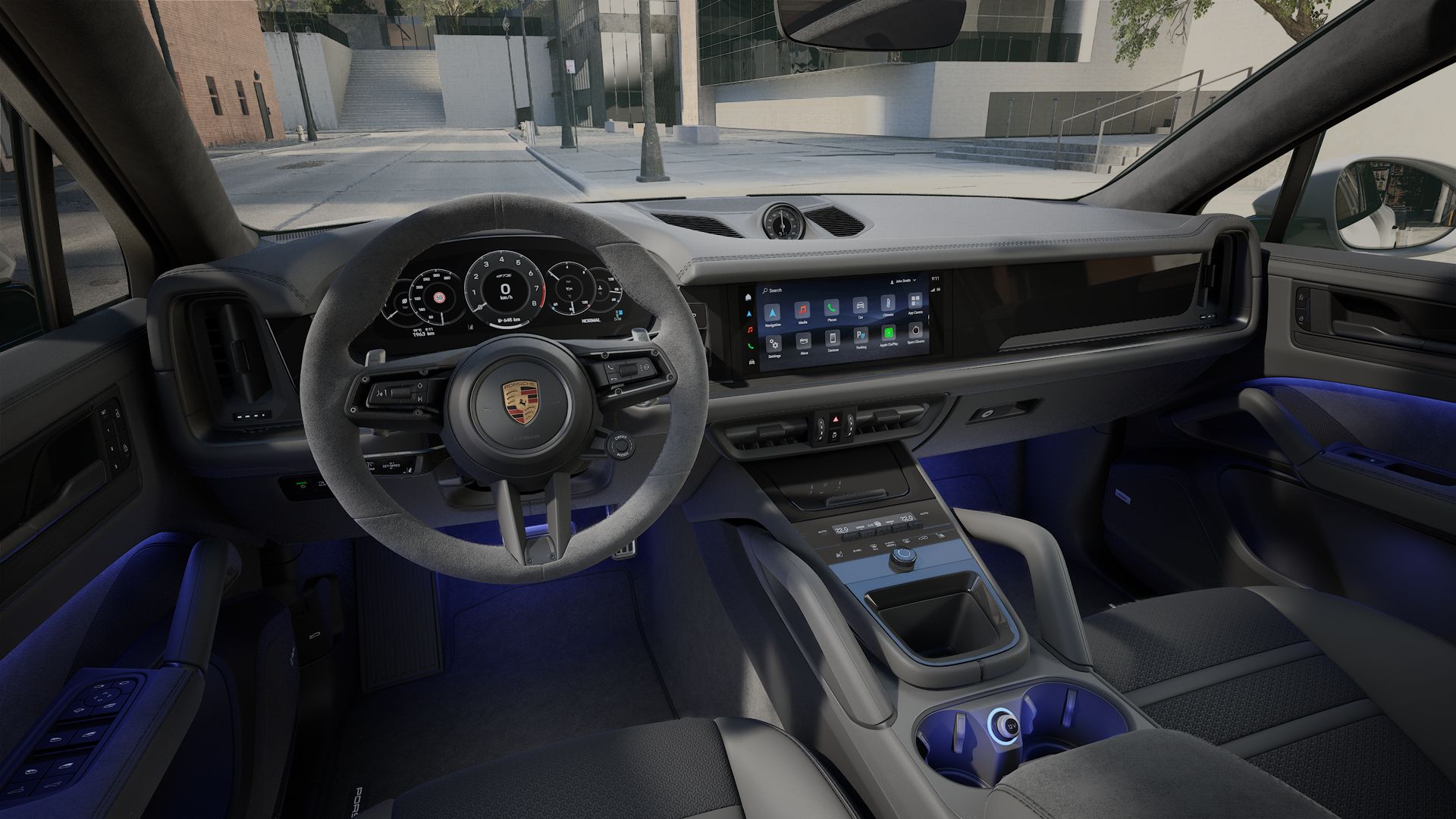 Interior view showing the steering wheel and dashboard of Cayenne GTS Coupe
