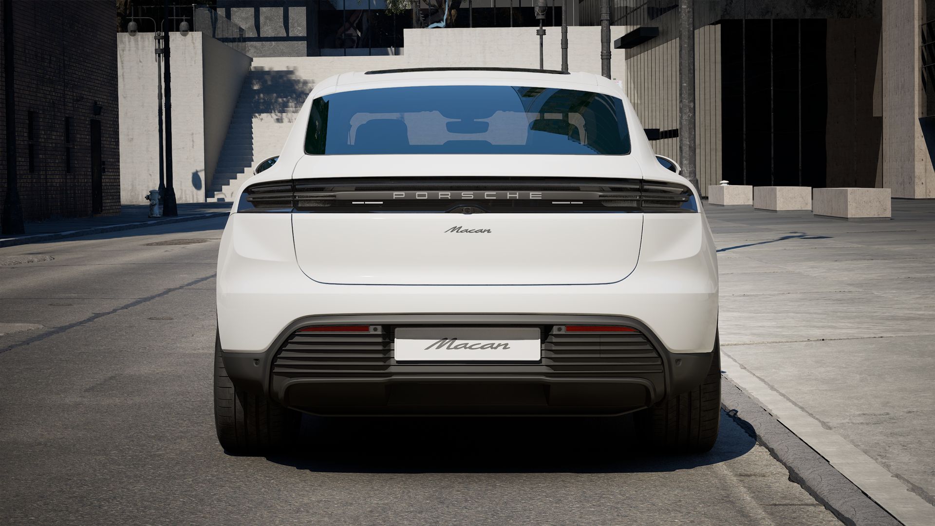 Exterior view of Macan Electric showing the rear of the car
