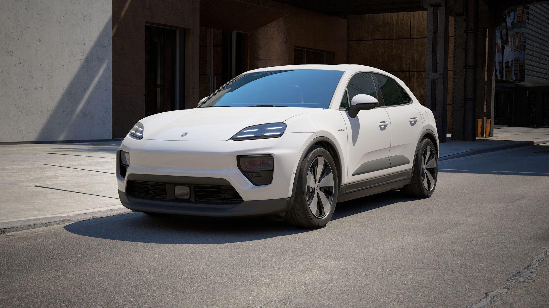 Exterior view of Macan Electric showing the front and left side of the car