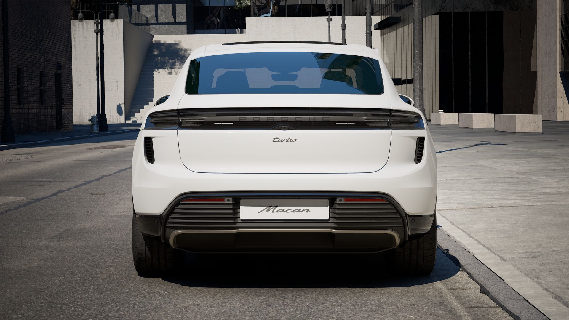 Exterior view of Macan Turbo Electric showing the rear of the car
