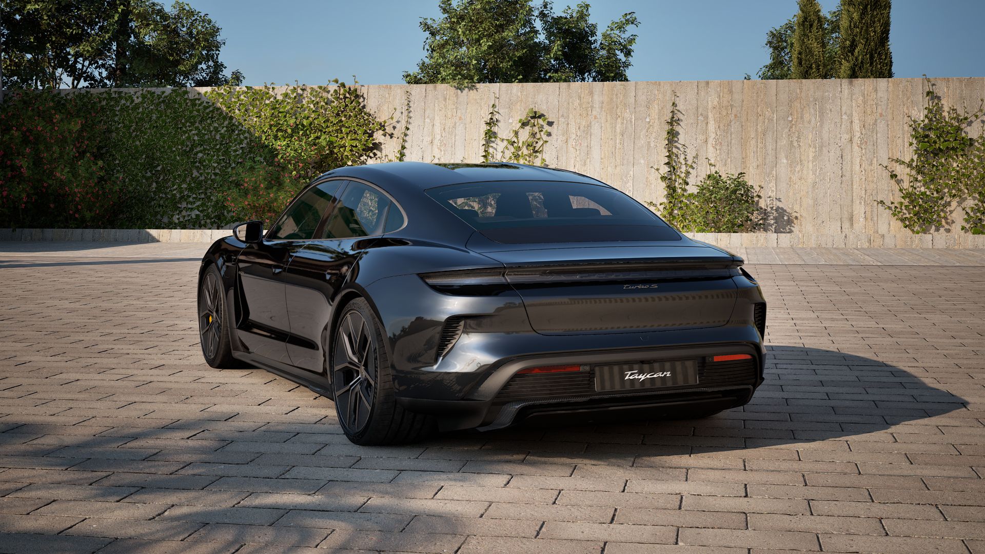 Exterior view of Taycan Turbo S showing the back and left side of the car