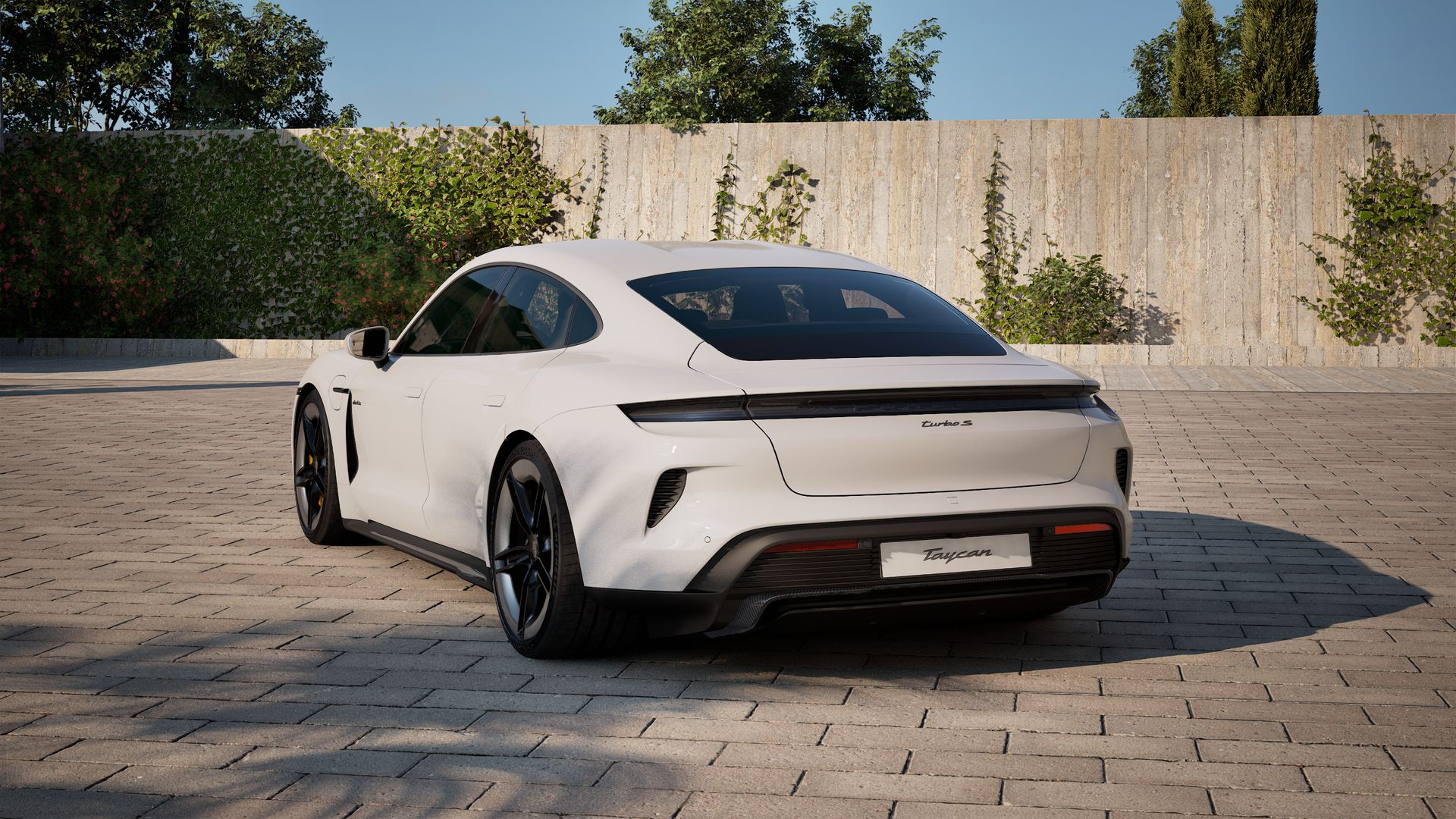 Exterior view of Taycan Turbo S showing the back and left side of the car
