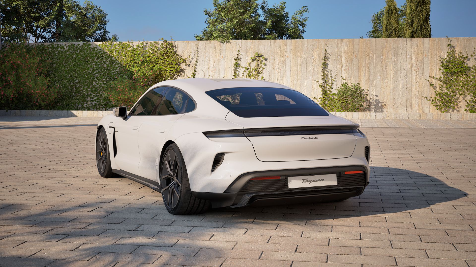 Exterior view of Taycan Turbo S showing the back and left side of the car