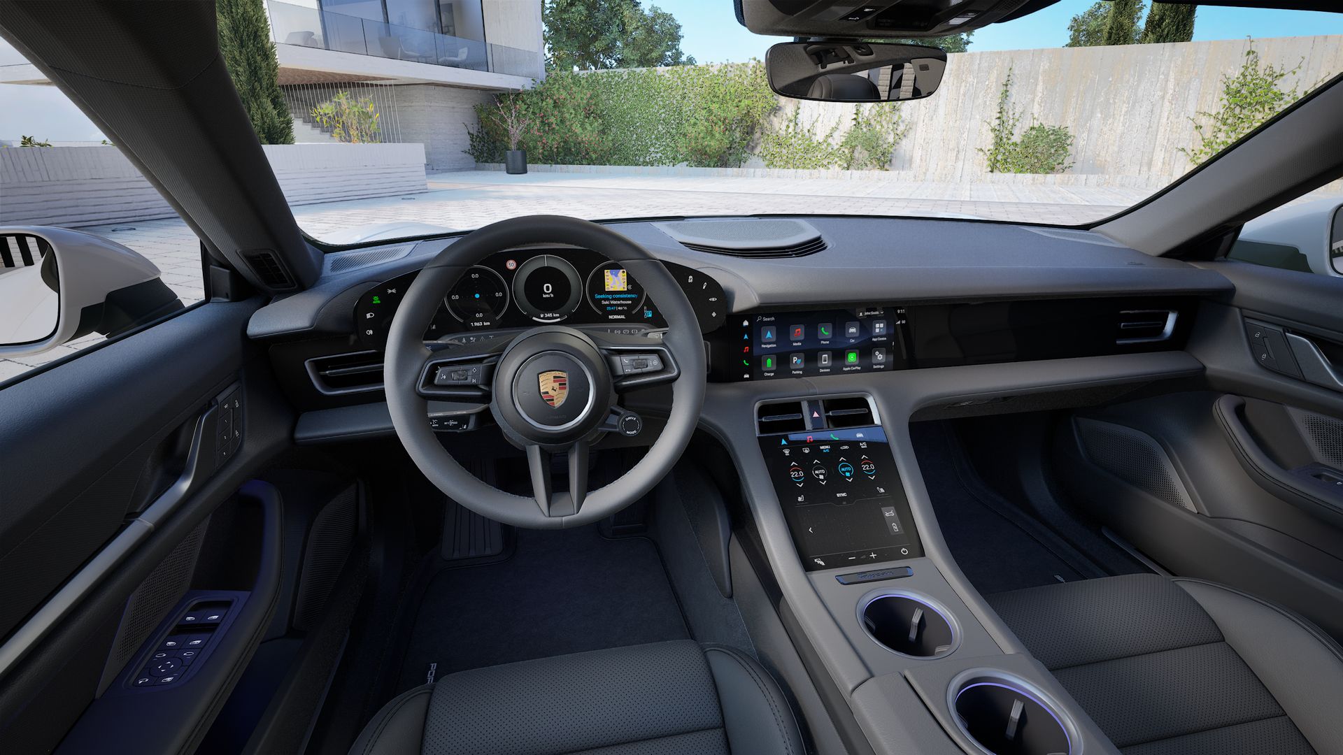 Interior view showing the steering wheel and dashboard of Taycan 4 Cross Turismo