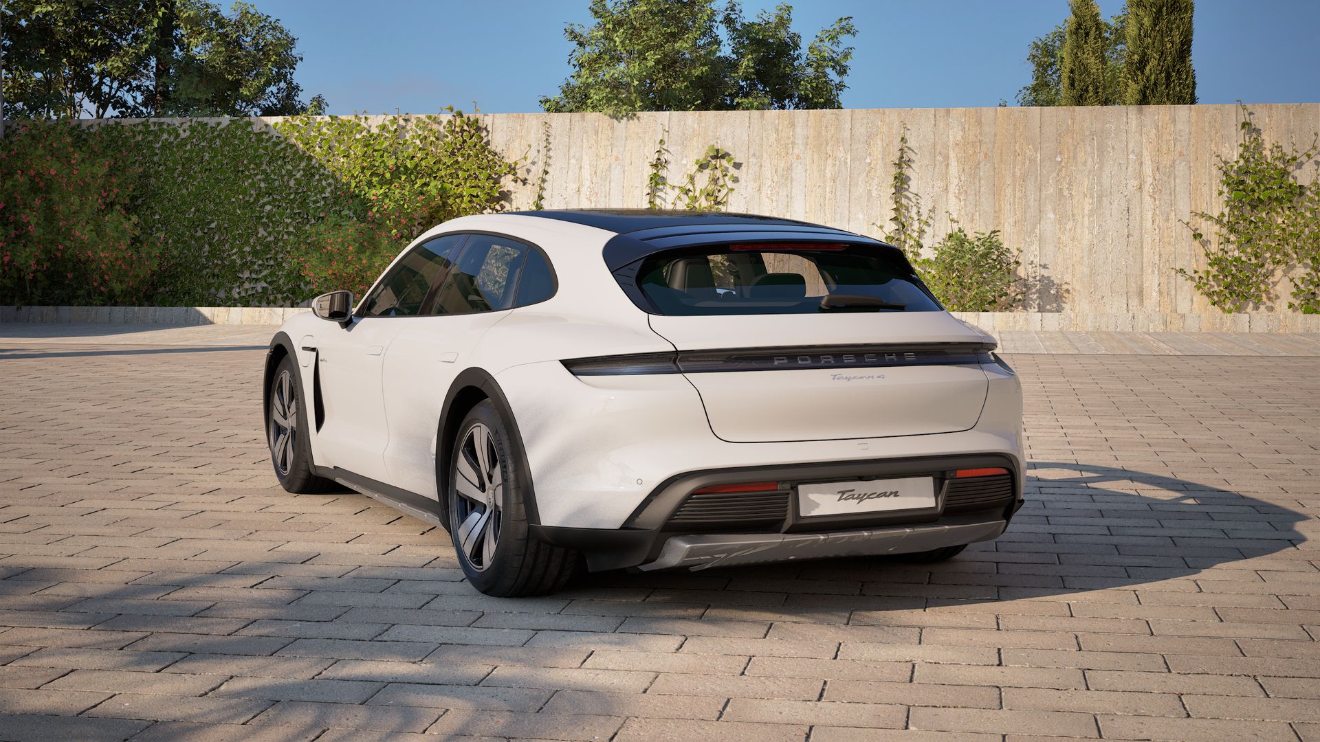 Exterior view of Taycan 4 Cross Turismo showing the back and left side of the car