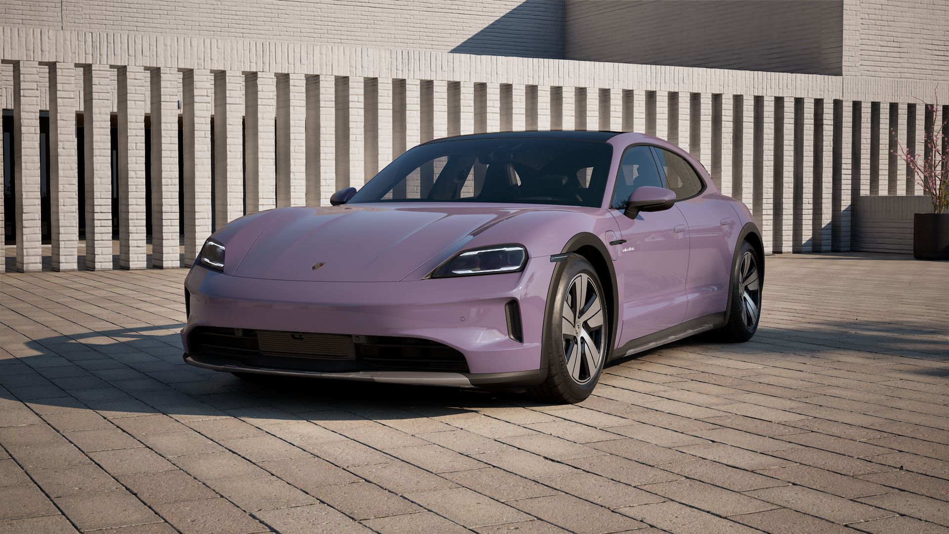 Exterior view of Taycan 4 Cross Turismo showing the front and left side of the car