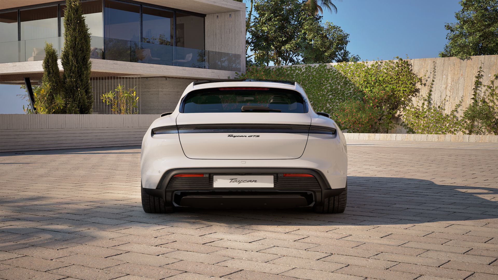 Exterior view of Taycan GTS Sport Turismo showing the rear of the car