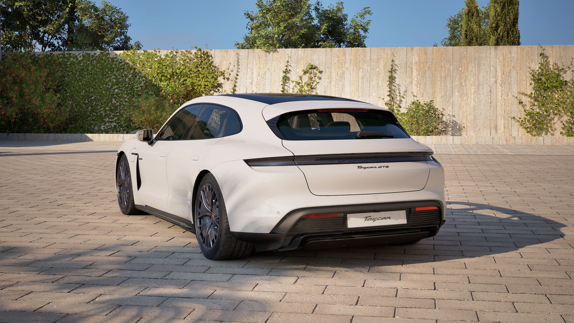 Exterior view of Taycan GTS Sport Turismo showing the back and left side of the car