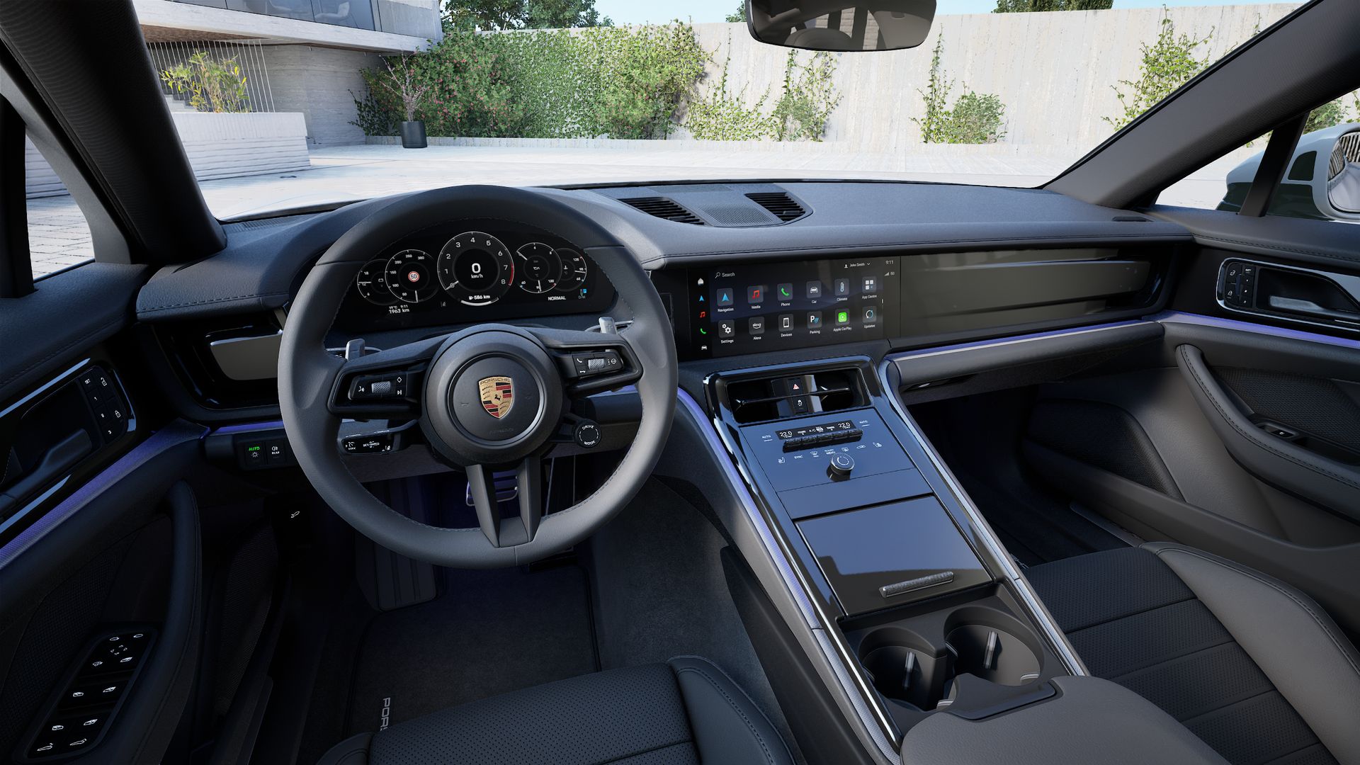 Interior view showing the steering wheel and dashboard of Panamera